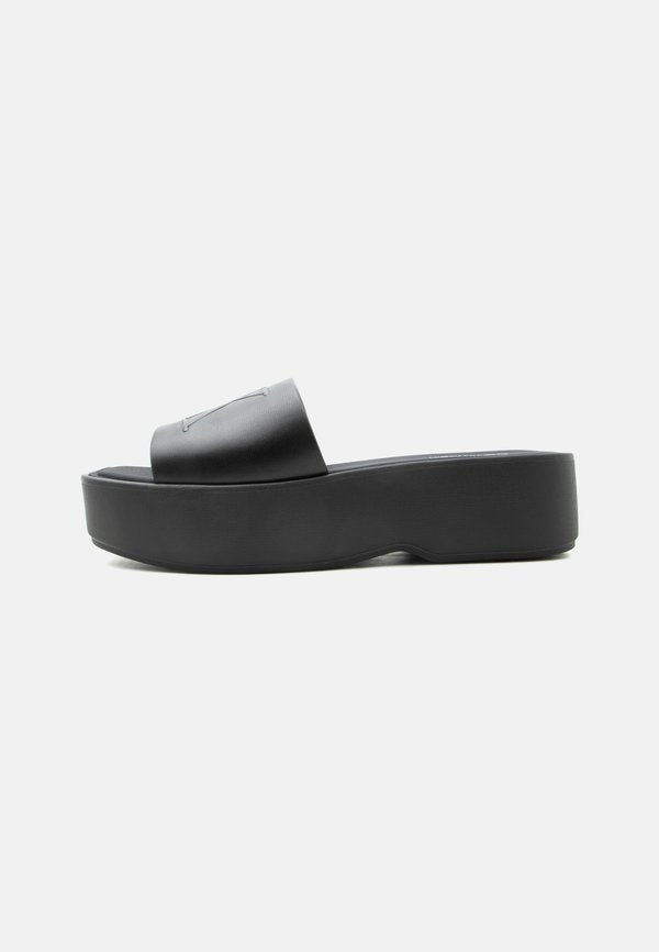 Calvin Klein Mules - triple black