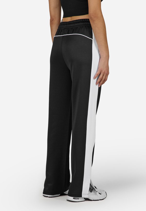Pegador MARTERA TRACK PANTS