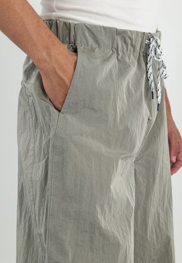 YOURTURN by Zalando REFLECTIVE TROUSERS UNISEX