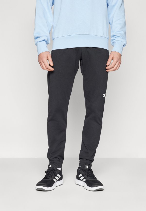 adidas Sportswear Tracksuit bottoms - black/white