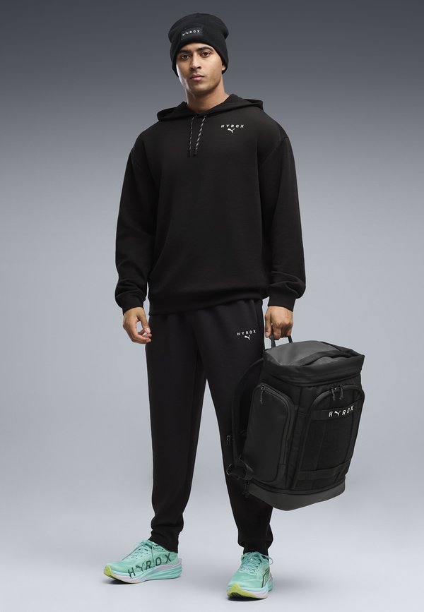 Puma M PUMA X HYROX CLOUDSPUN ELEVATED PANT - Tracksuit bottoms - black
