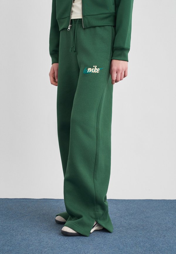 Nike Sportswear LOGO - Tracksuit bottoms - green