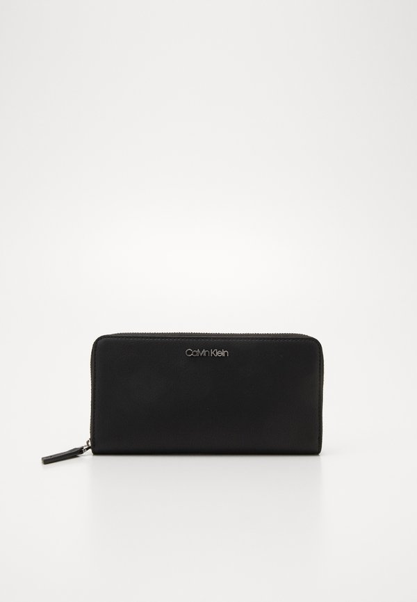 Calvin Klein MUST LARGE ZIP AROUND WALLET - Wallet - black