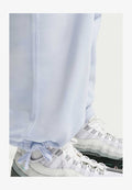 Nike Sportswear M NL SOLO SWSH BB OH PANT - Tracksuit bottoms - football grey football grey white