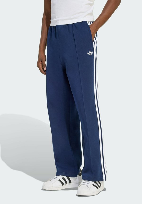 adidas Originals SPACER DRILL - Tracksuit bottoms - night indigo