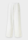 Puma GRAPHIC LEO LUXE BEDAZZLED SLOUCHY - Tracksuit bottoms - puma white
