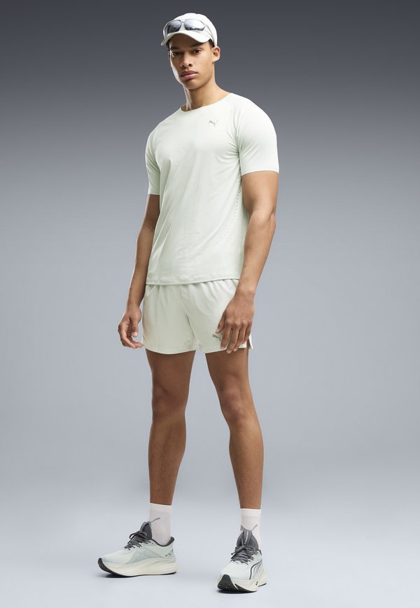 Puma M RUN CLOUDSPUN TEE - Basic T-shirt - créme de mint