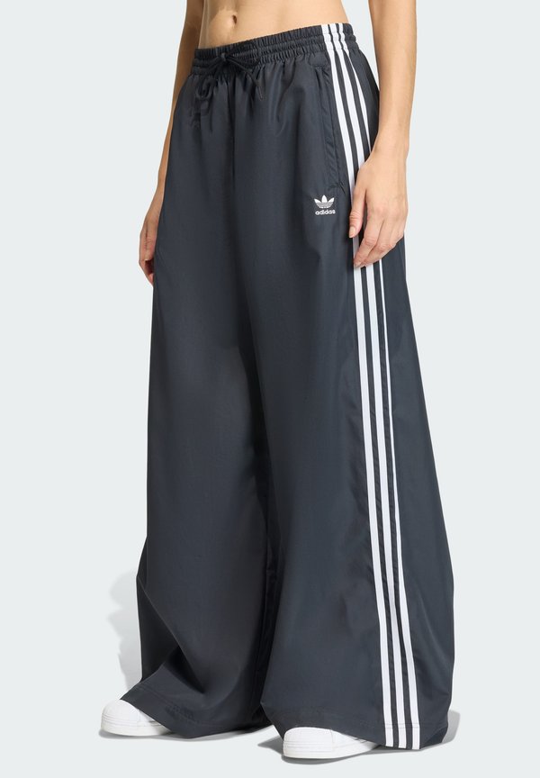 adidas Originals FIREBIRD - Tracksuit bottoms - black/white