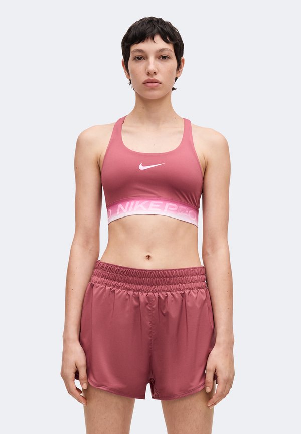 Nike Performance BRA - Medium support sports bra - pink smoke/bleached lilac/pink rise