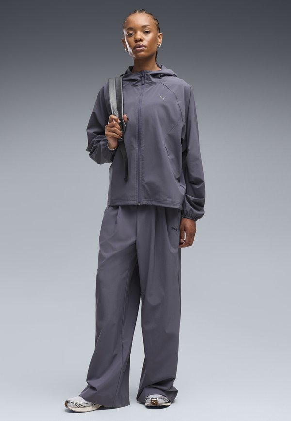 Puma PUMATECH SENSE 4-WAY STRETCH RELAXED HOSE - Trousers - inky depths