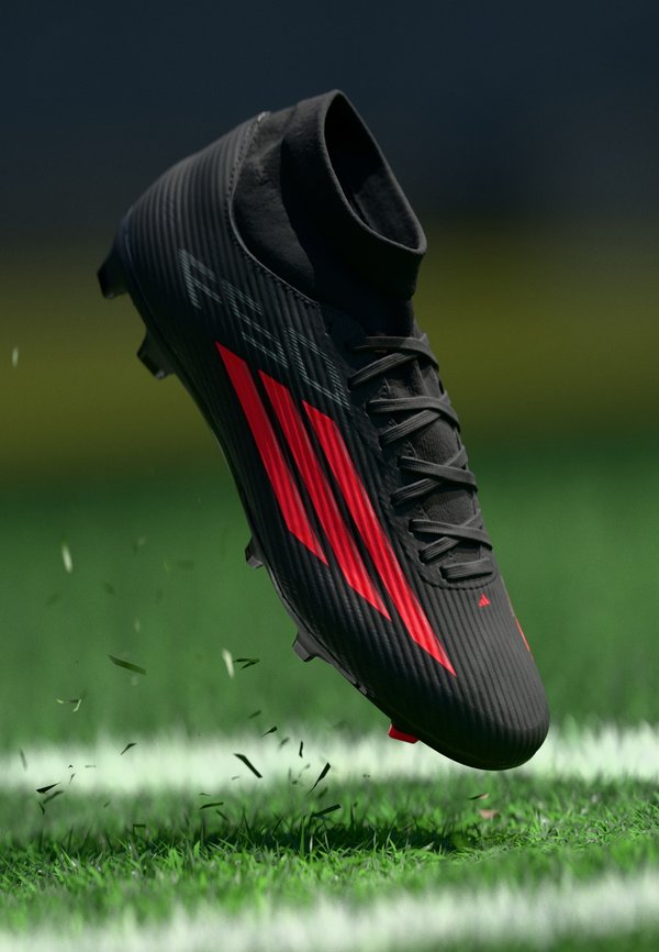 adidas Performance F50 LEAGUE MID CUT FIRM GROUND MULTI GROUND UNISEX - Football boots artificial grass - core black/lucid red