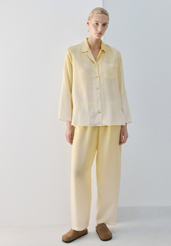 Mango Tracksuit bottoms - light yellow