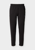 Puma EVOSTRIPE PANTS - Tracksuit bottoms - black