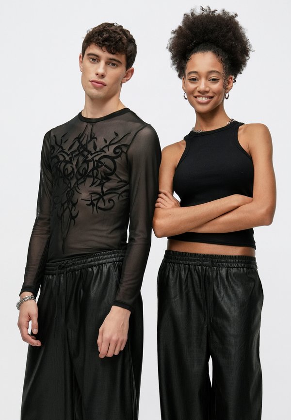 YOURTURN by Zalando UNISEX PU PARTY TROUSERS
