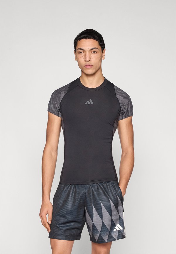 adidas Performance TECHFIT AOP - Sports T-shirt - black/onix