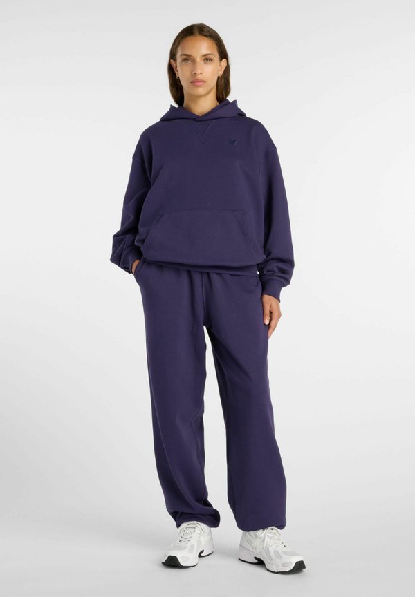 New Balance ATHLETICS FRENCH TERRY  - Tracksuit bottoms - boysenberry