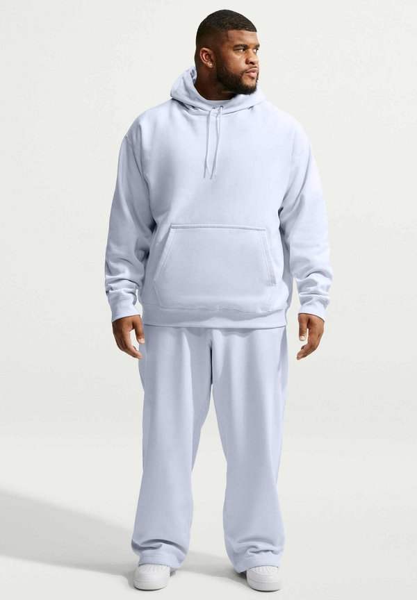 Nike Sportswear M NL SOLO SWSH BB OH PANT - Tracksuit bottoms - football grey football grey white