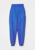 Nike Sportswear CLUB TRACK PANT - Tracksuit bottoms - game royal/white/obsidian