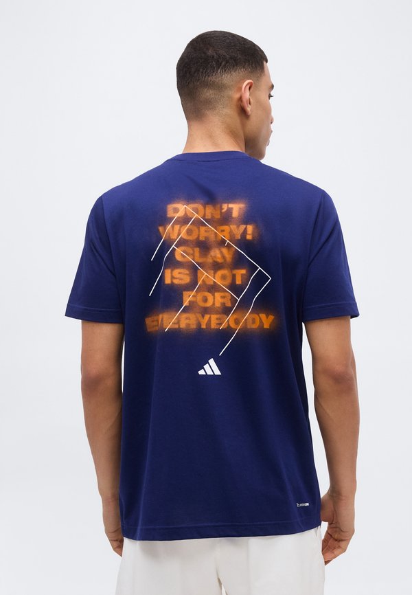 adidas Performance CLAY IS NOT GRAPHIC - Sports T-shirt - dark blue