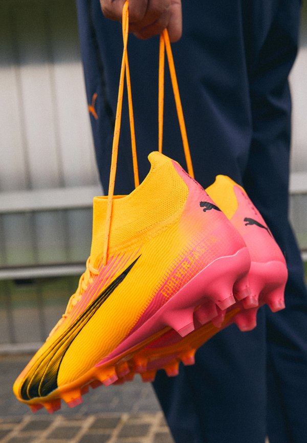 Puma ULTRA PRO FG/AG - Firm-ground football boots - sun stream/black/sunset glow