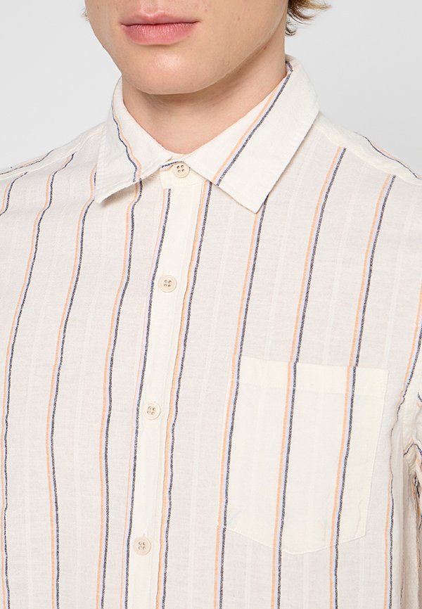 REVOLUTION LOOSE FIT