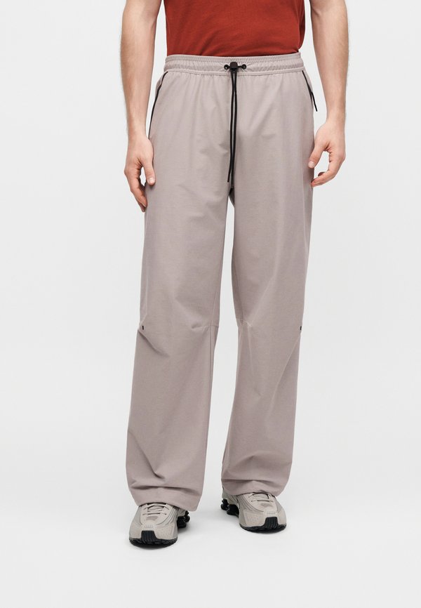 Nike Sportswear PANT - Tracksuit bottoms - college grey/black