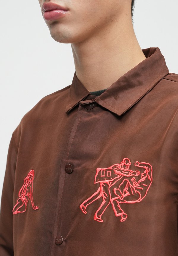 Jacker ROMANTIC FIGHT COACH JACKET UNISEX