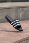 adidas Originals ADILETTE OG UNISEX - Mules - collegiate navy/footwear white/collegiate navy