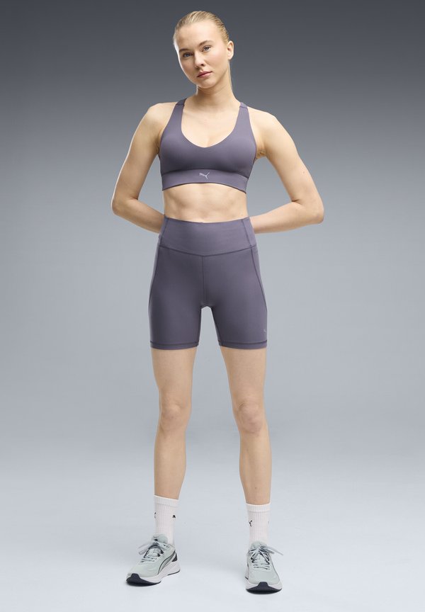 Puma SHAPELUXE BRA - MID - Medium support sports bra - inky depths