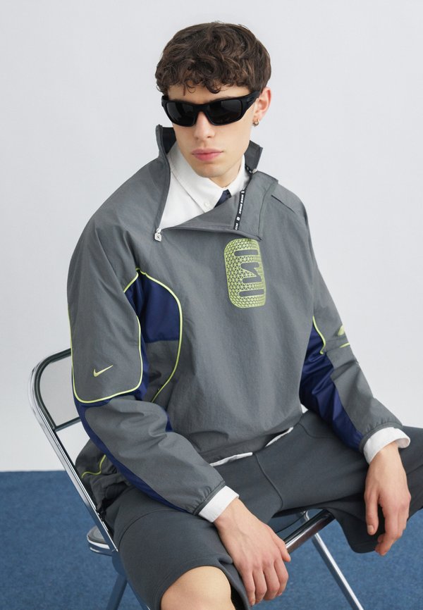 Nike Sportswear Light jacket - iron grey/midnight navy/lemon twist