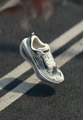 Nike Performance VOMERO PLUS SE - Road running shoes - phantom/pencil point/anthracite/college grey/vast grey/black