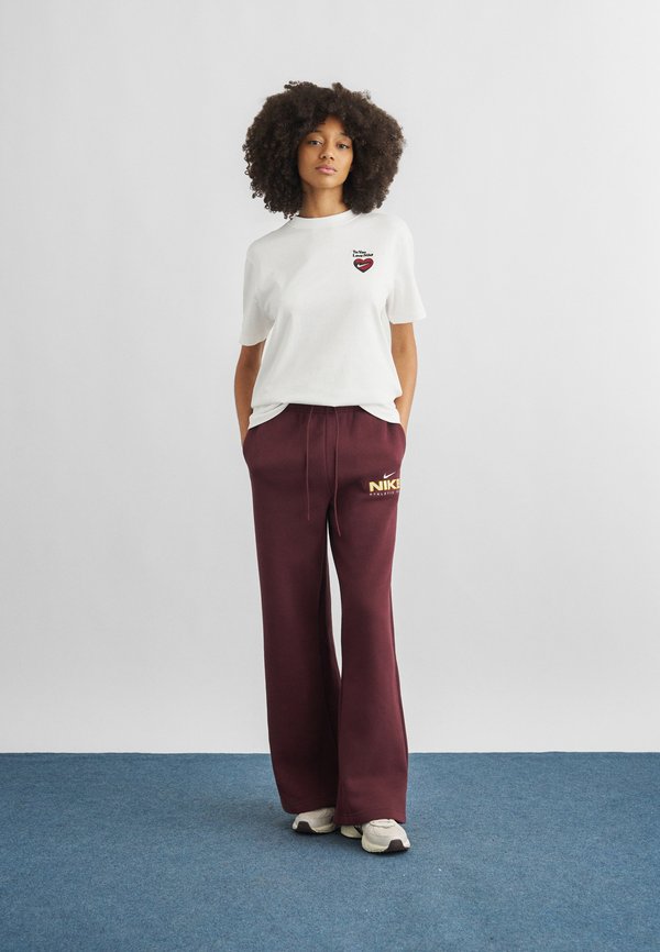 Nike Sportswear PANT WIDE - Tracksuit bottoms - burgundy crush