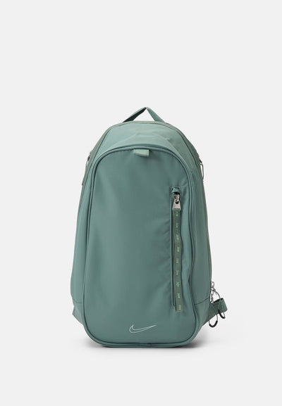 Nike Sportswear NK NSW COMMUTE SLING BAG UNISEX - Rucksack - clay green/clay green/(steam)