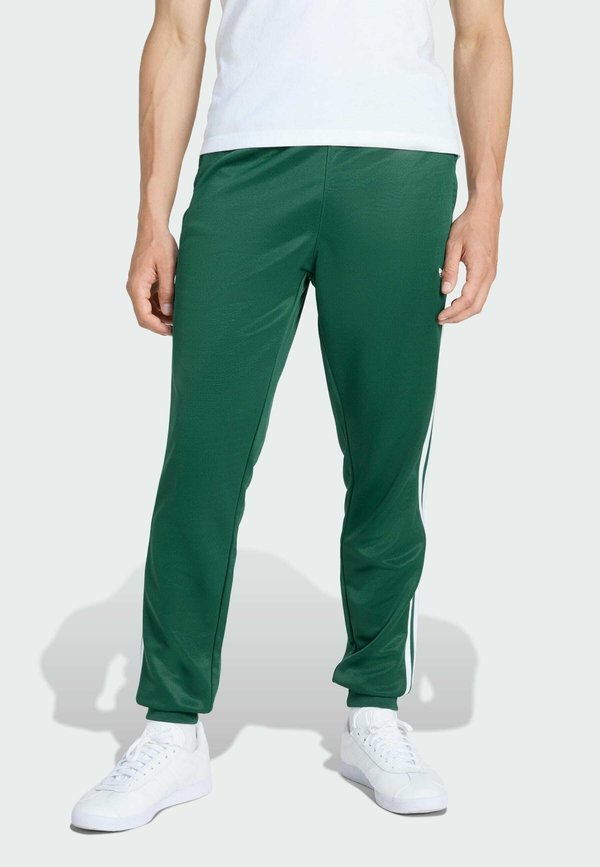 adidas Originals SST TP - Tracksuit bottoms - collegiate green