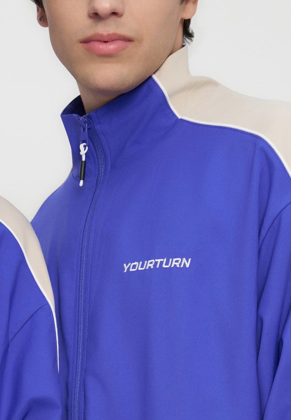YOURTURN by Zalando RELAXED FIT WINDBREAKER