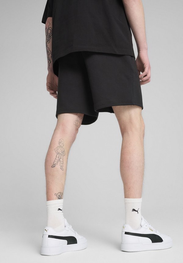 Puma Tracksuit bottoms - black
