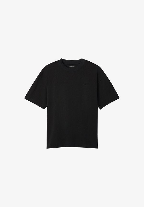 Calvin Klein Jeans CALVIN KLEIN JEANS OVERSIZED EMBOSSED LOGO T-SHIRT - Print T-shirt - black